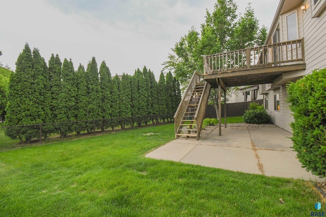 6312 S Heatherridge Ave, Sioux Falls, SD 57108 - fenced backyard with a patio, stairs, and a wooden deck
