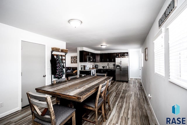 3601 S Holbrook Ave, Sioux Falls, SD 57106 - dining area with dark wood-style floors