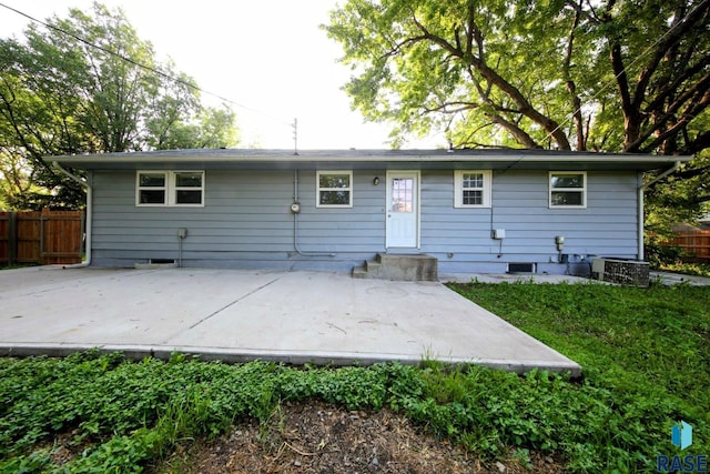 3601 S Holbrook Ave, Sioux Falls, SD 57106 - rear view of house featuring a patio and entry steps
