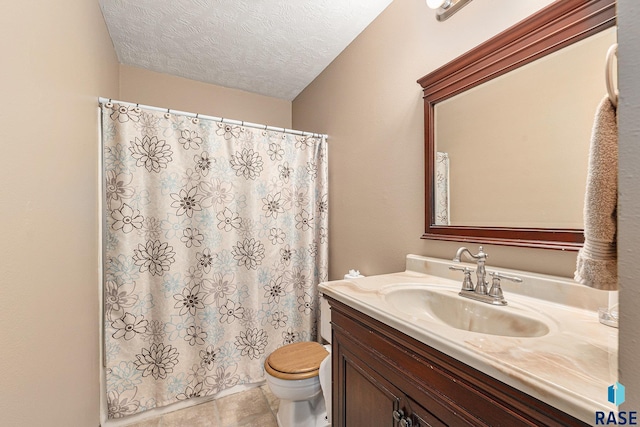 5909 W Bakker Park Dr, Sioux Falls, SD 57106 - full bath featuring vanity, tile patterned floors, a textured ceiling, and curtained shower
