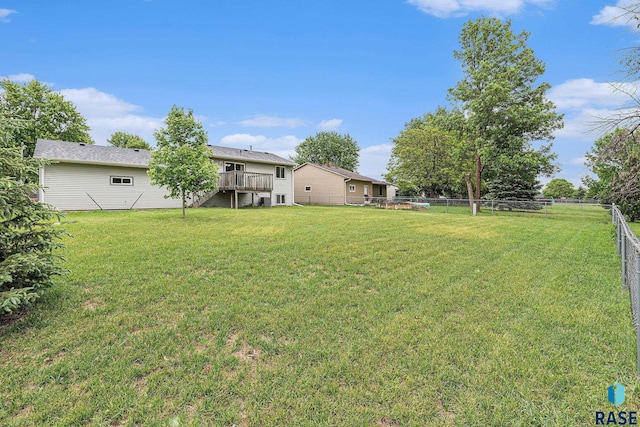 5909 W Bakker Park Dr, Sioux Falls, SD 57106 - view of yard with a deck