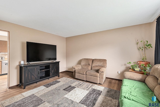 5909 W Bakker Park Dr, Sioux Falls, SD 57106 - living area with wood finished floors and baseboards