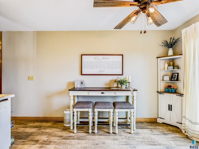 26481 487th Ave, Valley Springs, SD 57068 - dining area with ceiling fan and wood finished floors