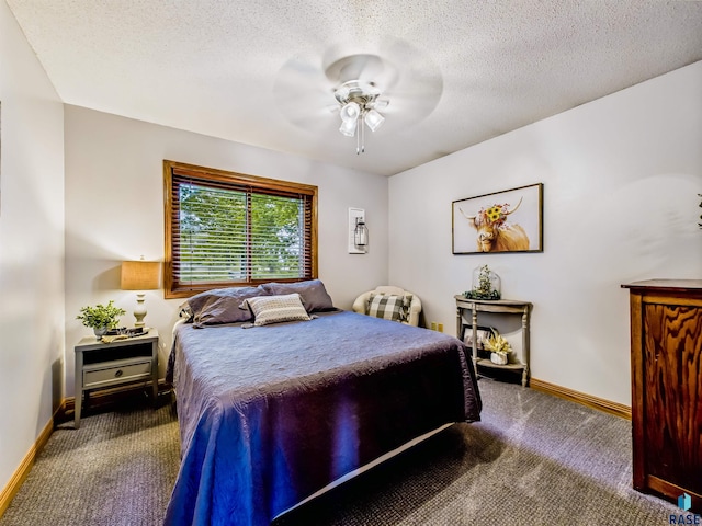 26481 487th Ave, Valley Springs, SD 57068 - carpeted bedroom with a ceiling fan and a textured ceiling