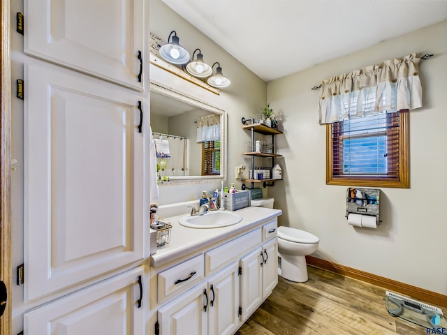 26481 487th Ave, Valley Springs, SD 57068 - full bath featuring vanity, wood finished floors, and a shower with shower curtain