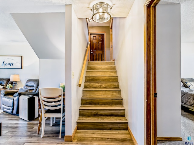 26481 487th Ave, Valley Springs, SD 57068 - stairs featuring wood finished floors