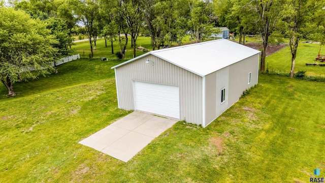 26481 487th Ave, Valley Springs, SD 57068 - detached garage with view of wooded area and concrete driveway