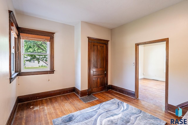 108 S Sycamore Ave, Sioux Falls, SD 57110 - unfurnished bedroom with wood-type flooring and baseboards