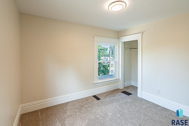 108 S Sycamore Ave, Sioux Falls, SD 57110 - unfurnished bedroom with carpet floors and a closet