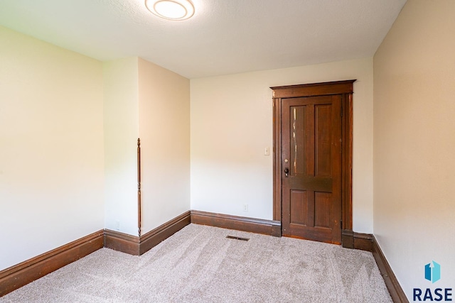 108 S Sycamore Ave, Sioux Falls, SD 57110 - carpeted empty room featuring baseboards