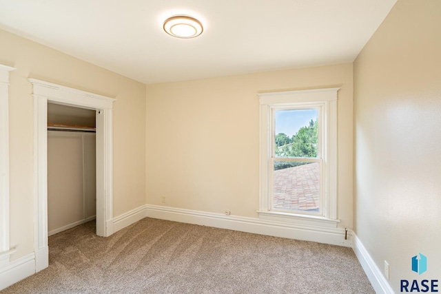 108 S Sycamore Ave, Sioux Falls, SD 57110 - unfurnished bedroom with light colored carpet and a closet