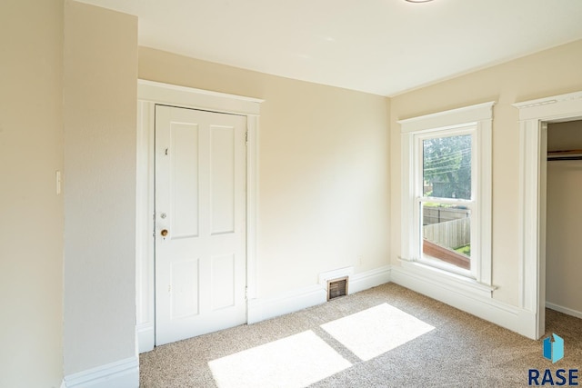 108 S Sycamore Ave, Sioux Falls, SD 57110 - unfurnished bedroom with carpet and baseboards