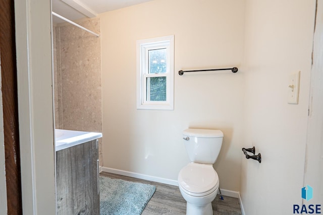 108 S Sycamore Ave, Sioux Falls, SD 57110 - full bath featuring wood finished floors, vanity, and a shower