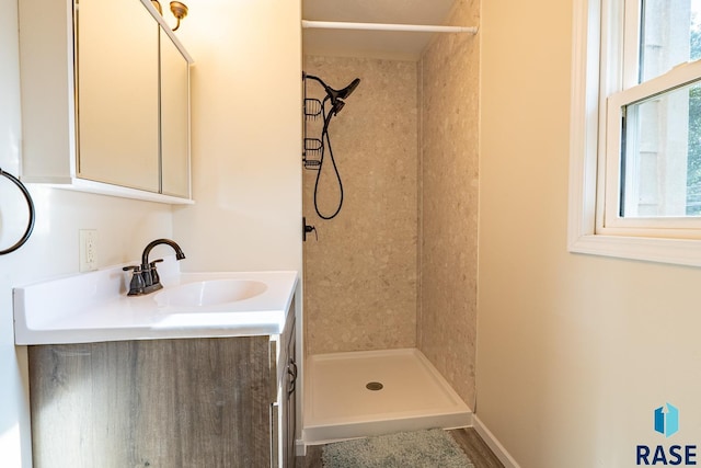108 S Sycamore Ave, Sioux Falls, SD 57110 - full bath featuring a tile shower and vanity