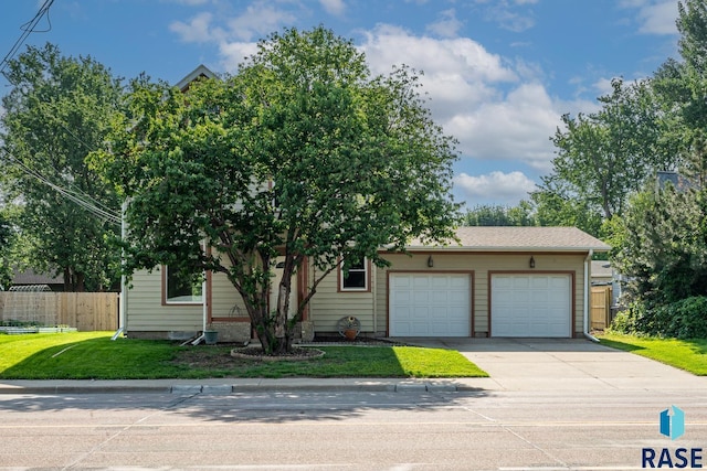 108 S Sycamore Ave, Sioux Falls, SD 57110 - view of front of property featuring concrete driveway and an attached garage
