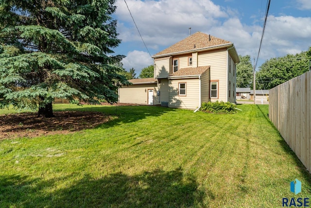 108 S Sycamore Ave, Sioux Falls, SD 57110 - rear view of property with roof with shingles