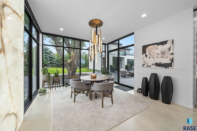 8009 Windswept Cir, Sioux Falls, SD 57108 - dining space with floor to ceiling windows and finished concrete flooring