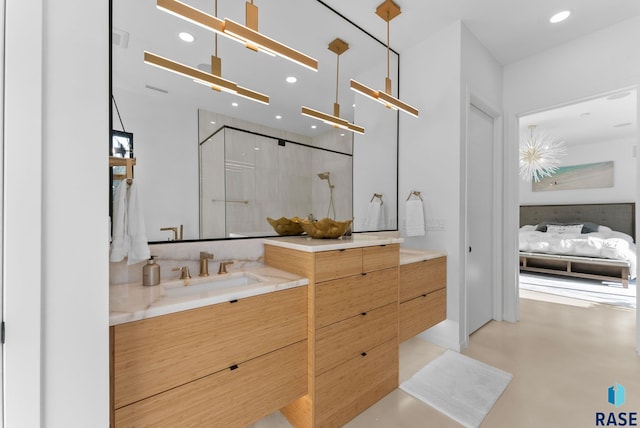 8009 Windswept Cir, Sioux Falls, SD 57108 - bathroom featuring vanity, a shower stall, recessed lighting, finished concrete floors, and connected bathroom