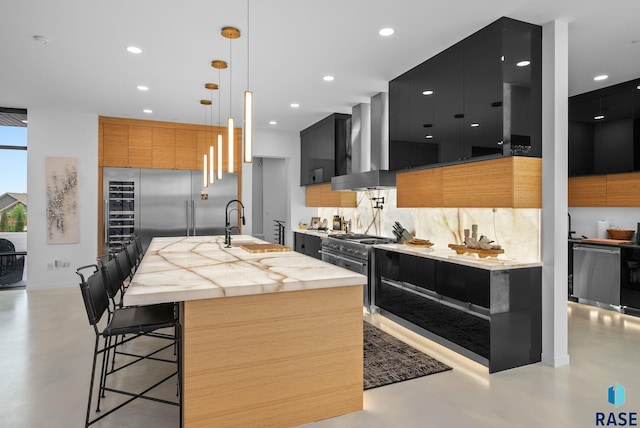 8009 Windswept Cir, Sioux Falls, SD 57108 - kitchen featuring wall chimney exhaust hood, modern cabinets, finished concrete floors, and recessed lighting