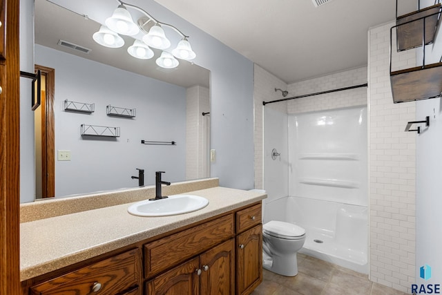 908 W 4th Ave, Lennox, SD 57039 - bathroom featuring vanity, tile patterned flooring, and a shower