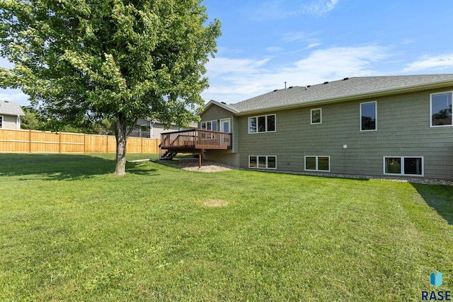 908 W 4th Ave, Lennox, SD 57039 - rear view of house with a deck