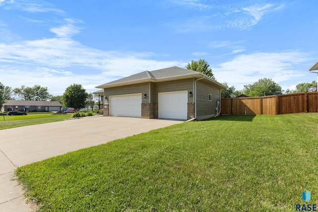 908 W 4th Ave, Lennox, SD 57039 - view of side of property featuring brick siding and driveway