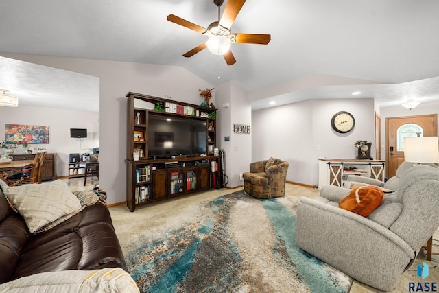 1905 S Wheatland Ct, Sioux Falls, SD 57106 - living area with vaulted ceiling, a ceiling fan, and carpet