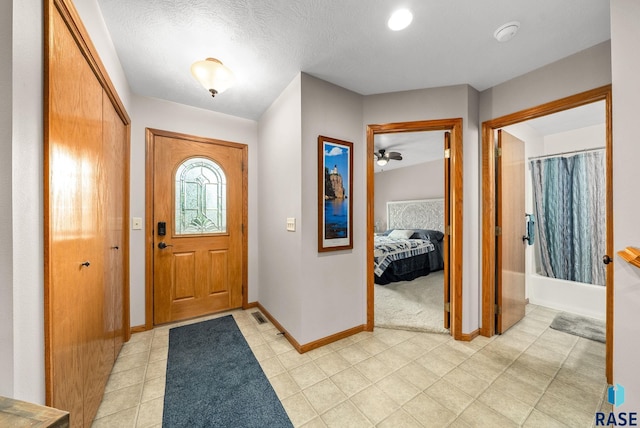 1905 S Wheatland Ct, Sioux Falls, SD 57106 - entrance foyer featuring baseboards and light tile patterned floors