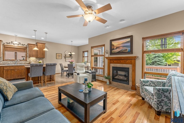 2213 S Purdue Ave, Sioux Falls, SD 57106 - living room featuring healthy amount of natural light, light wood-style flooring, ceiling fan, and recessed lighting