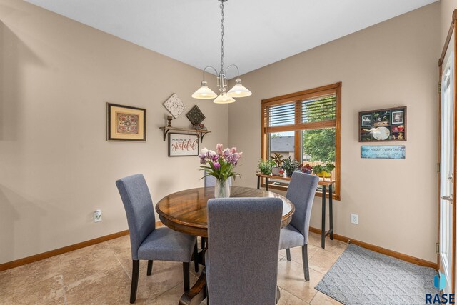 2213 S Purdue Ave, Sioux Falls, SD 57106 - dining area featuring baseboards and light tile patterned flooring