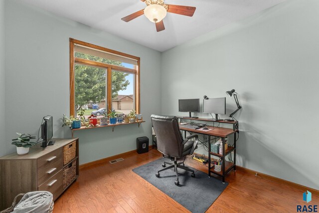 2213 S Purdue Ave, Sioux Falls, SD 57106 - home office featuring ceiling fan and wood finished floors