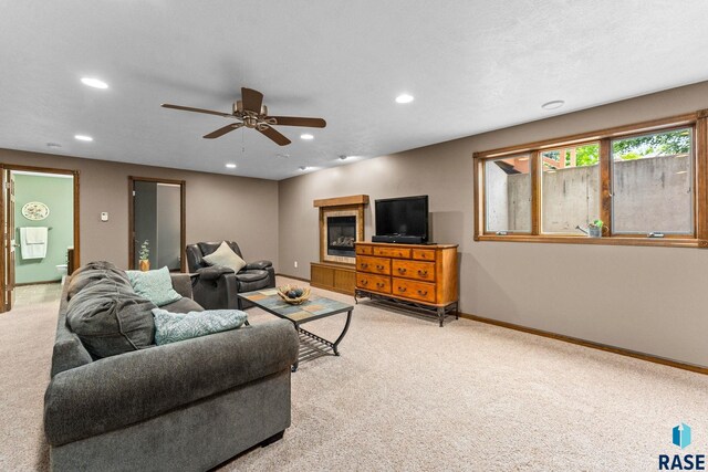 2213 S Purdue Ave, Sioux Falls, SD 57106 - living area with light colored carpet, recessed lighting, and ceiling fan