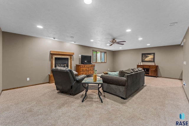 2213 S Purdue Ave, Sioux Falls, SD 57106 - living room featuring light carpet, recessed lighting, a ceiling fan, and a tiled fireplace