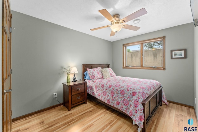2213 S Purdue Ave, Sioux Falls, SD 57106 - bedroom featuring light wood finished floors and a ceiling fan
