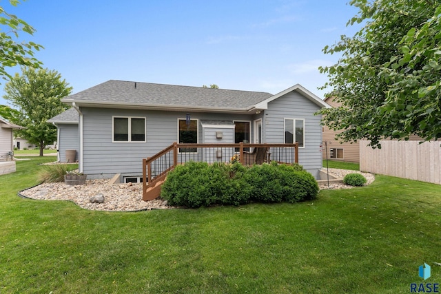 2213 S Purdue Ave, Sioux Falls, SD 57106 - rear view of house with a yard and roof with shingles
