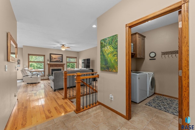 2213 S Purdue Ave, Sioux Falls, SD 57106 - hallway with separate washer and dryer and an upstairs landing
