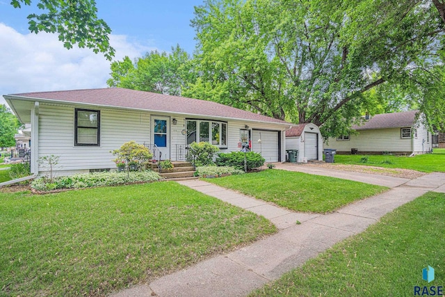 508 E Crawford St, Luverne, MN 56156 - ranch-style house with concrete driveway, a garage, a front yard, and a shingled roof
