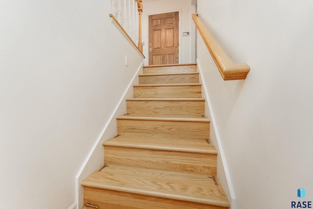 915 E Ridge Rd, Sioux Falls, SD 57105 - staircase with baseboards