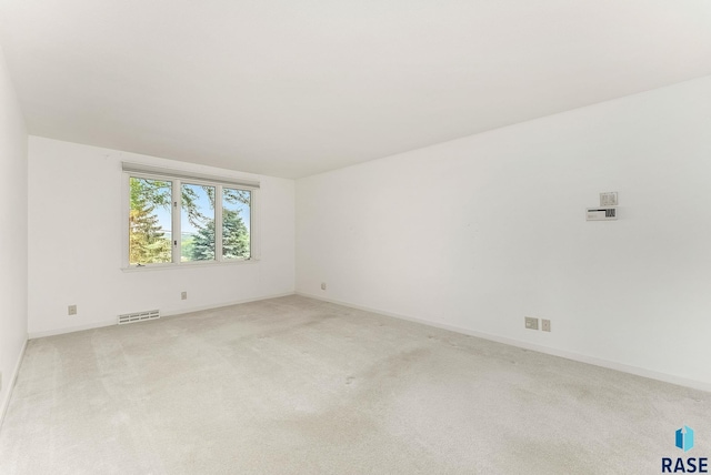 915 E Ridge Rd, Sioux Falls, SD 57105 - carpeted empty room featuring baseboards