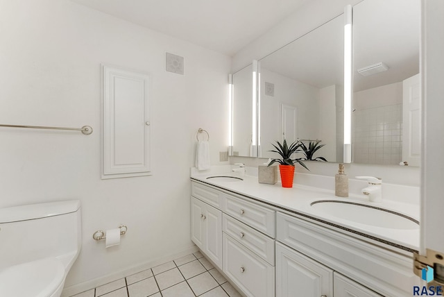915 E Ridge Rd, Sioux Falls, SD 57105 - bathroom with double vanity and tile patterned flooring