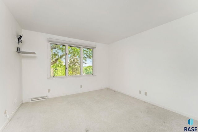 915 E Ridge Rd, Sioux Falls, SD 57105 - carpeted spare room featuring baseboards