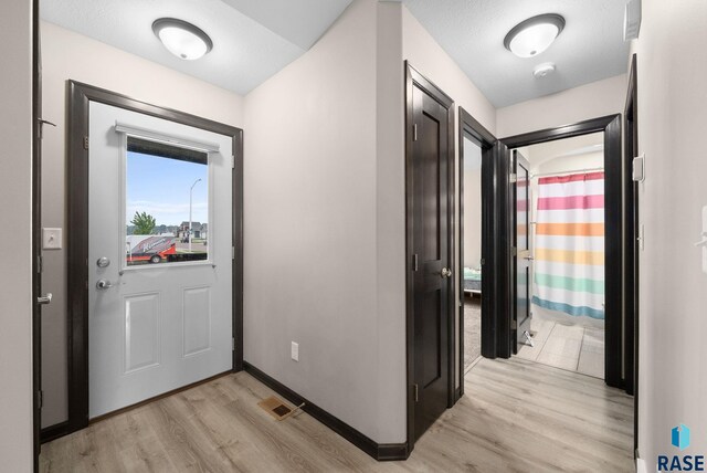 7513 E 49th St, Sioux Falls, SD 57110 - foyer entrance featuring light wood-type flooring