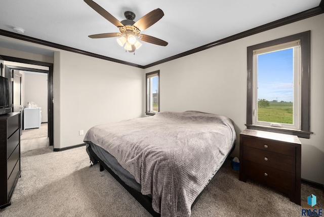 7513 E 49th St, Sioux Falls, SD 57110 - bedroom with carpet flooring, ornamental molding, and ceiling fan