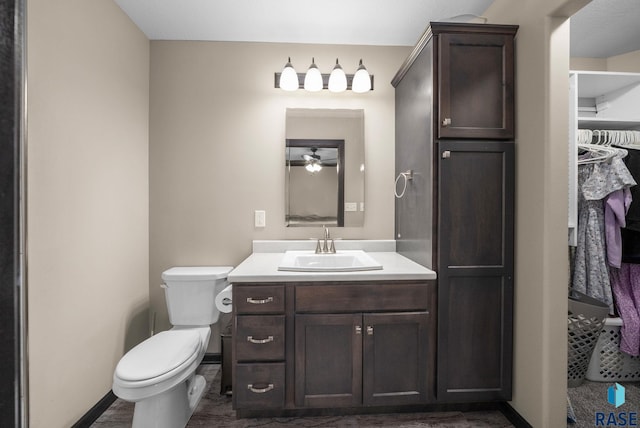 7513 E 49th St, Sioux Falls, SD 57110 - bathroom with vanity and ceiling fan