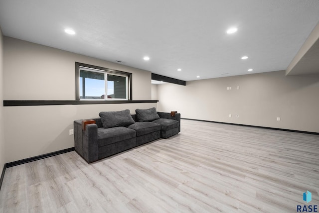 7513 E 49th St, Sioux Falls, SD 57110 - living room featuring wood finished floors and recessed lighting