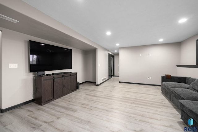 7513 E 49th St, Sioux Falls, SD 57110 - living area featuring light wood-type flooring and recessed lighting