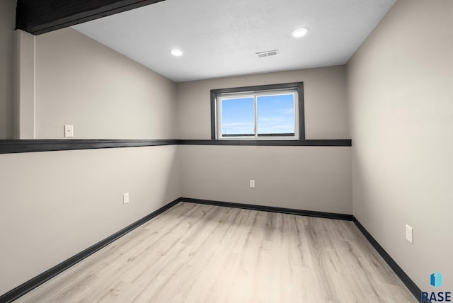 7513 E 49th St, Sioux Falls, SD 57110 - unfurnished room with light wood-type flooring and recessed lighting