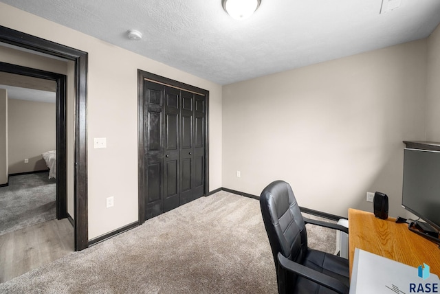 7513 E 49th St, Sioux Falls, SD 57110 - home office featuring carpet and wood finished floors