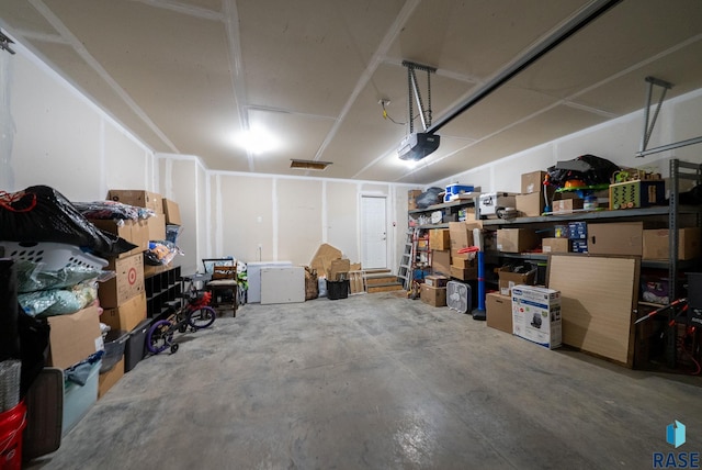 7513 E 49th St, Sioux Falls, SD 57110 - garage with a garage door opener