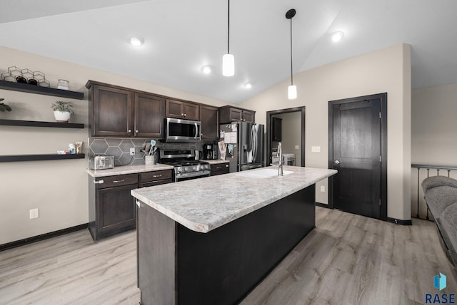 7513 E 49th St, Sioux Falls, SD 57110 - kitchen featuring stainless steel appliances, light countertops, dark brown cabinetry, light wood-type flooring, and lofted ceiling